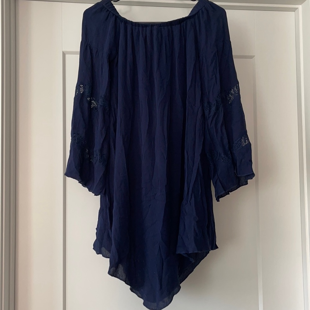 Off the shoulder dress.